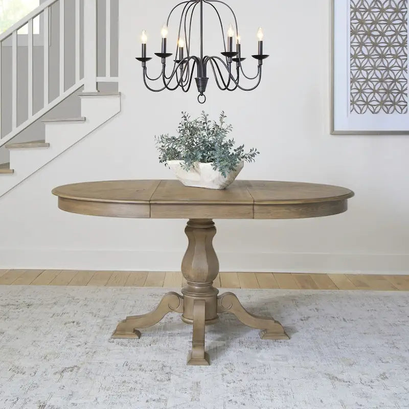 Tavolo da pranzo rotondo Magnolia Manor con base a piedistallo e prolunghe – 2 finiture