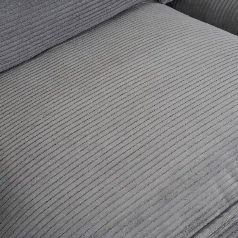 Divano modulare, divano componibile a L rivestito in velluto a coste con tasche laterali e pouf mobile
