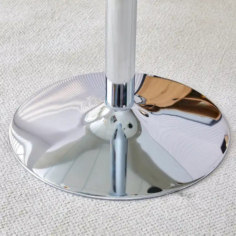 Tavolo da pranzo circolare moderno con elegante piano in vetro e robuste gambe in metallo per vari ambienti