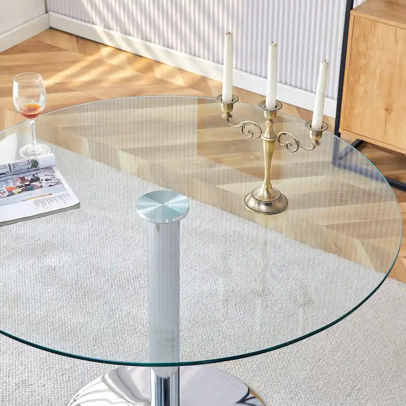 Tavolo da pranzo circolare moderno con elegante piano in vetro e robuste gambe in metallo per vari ambienti