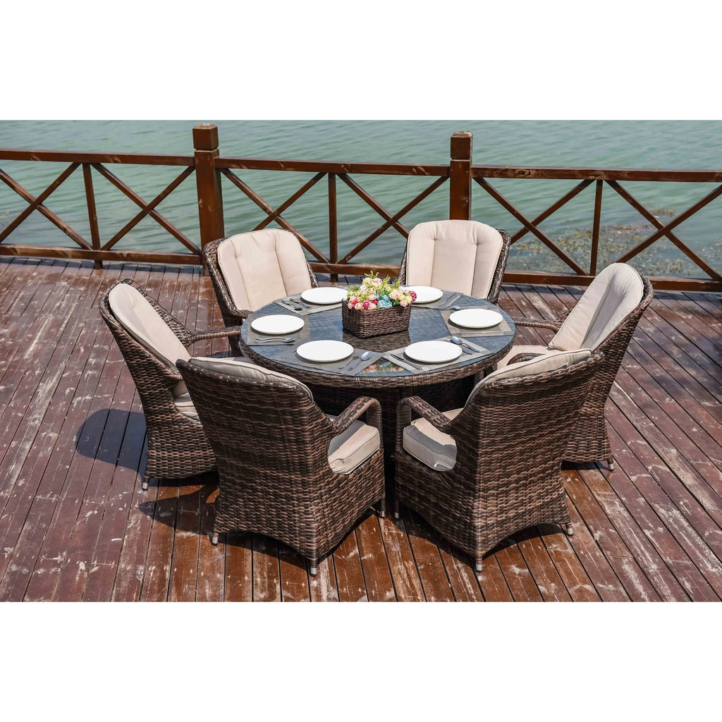 Set da pranzo rotondo da esterno in 7 pezzi in vimini di rattan con cuscini di Moda Furnishings