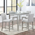 Set da pranzo moderno di 5 pezzi con tavolo quadrato ad altezza bancone e 4 sedie imbottite