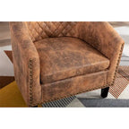 Poltrona a barile accent per soggiorno con borchie e gambe in legno massello