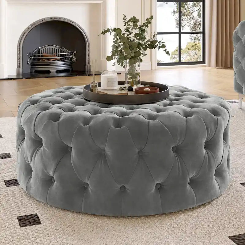Pouf rotondo trapuntato in velluto Corvus Chesterfield con rotelle