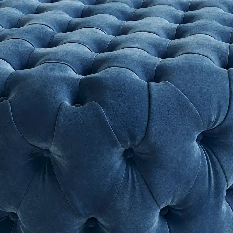 Pouf rotondo trapuntato in velluto Corvus Chesterfield con rotelle