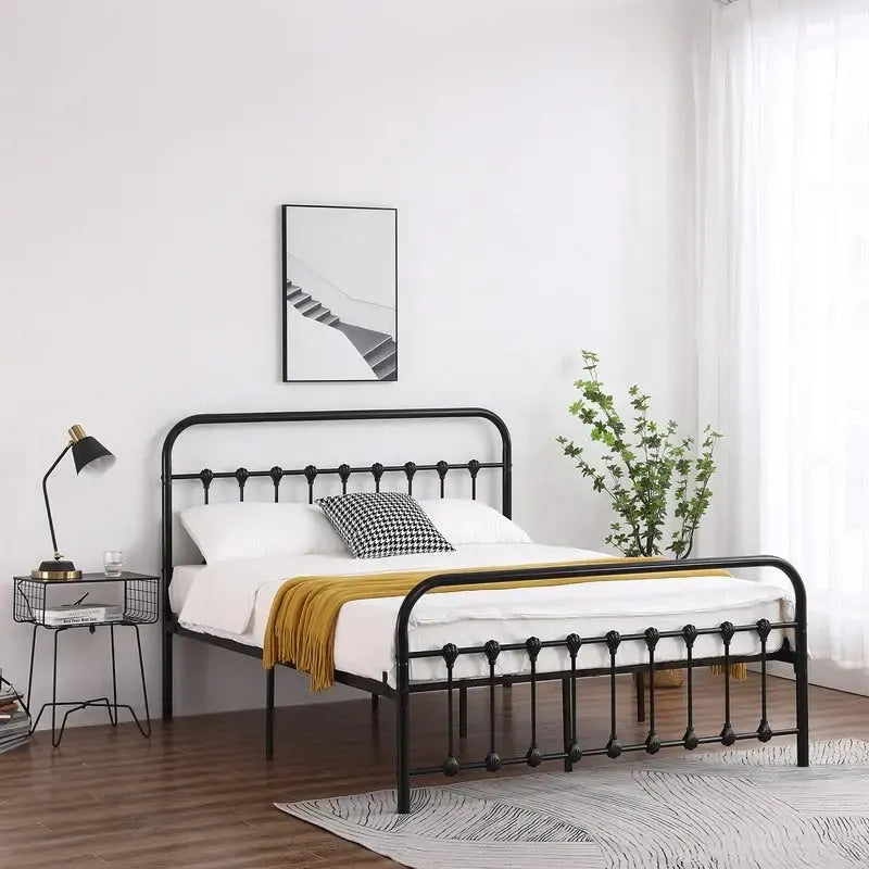Struttura letto singola in ferro con decorazioni a conchiglia, colore nero