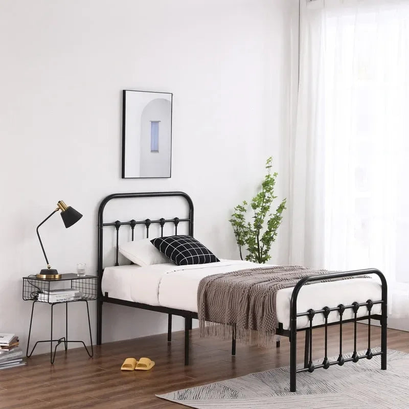 Struttura letto singola in ferro con decorazioni a conchiglia, colore nero