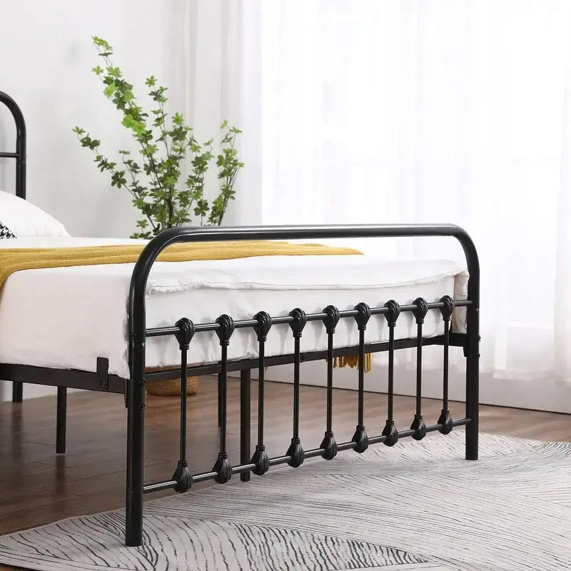 Struttura letto singola in ferro con decorazioni a conchiglia, colore nero