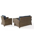 Set da salotto Crosley Bradenton da 3 pezzi in vimini per esterni con cuscini blu navy