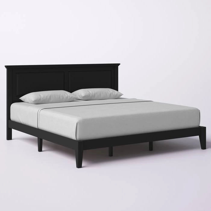 Letto a piattaforma in rovere massello con gambe affusolate e testiera