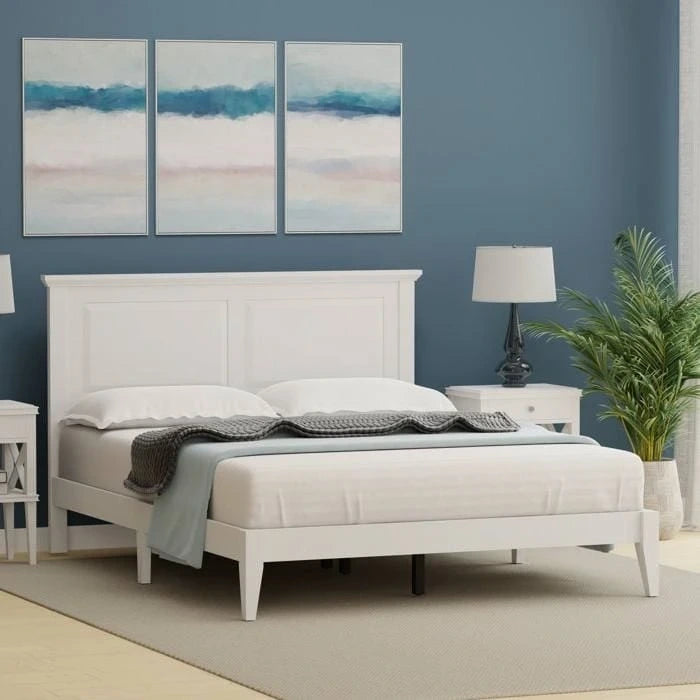 Letto a piattaforma in rovere massello con gambe affusolate e testiera