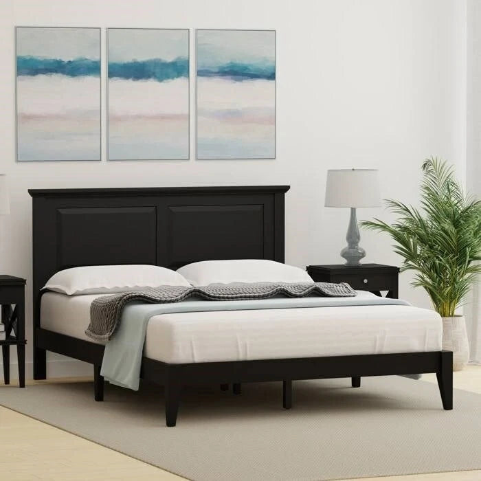 Letto a piattaforma in rovere massello con gambe affusolate e testiera