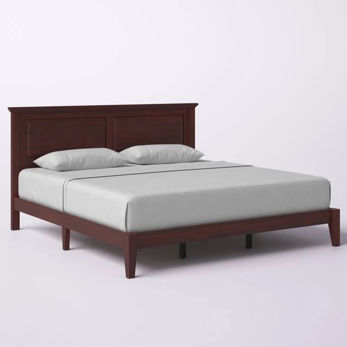 Letto a piattaforma in rovere massello con gambe affusolate e testiera