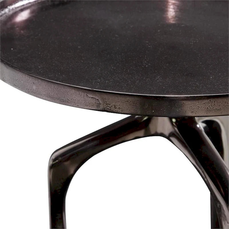 Tavolino rotondo contemporaneo in metallo con finitura sottile, eleganza moderna