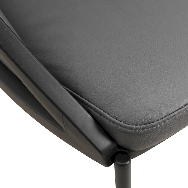 Sedia da pranzo imbottita Urbane in similpelle con gambe in acciaio verniciato a polvere di LeisureMod