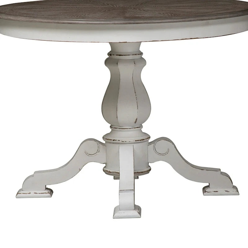 Tavolo da pranzo rotondo Magnolia Manor con base a piedistallo e prolunghe – 2 finiture