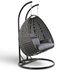 LeisureMod Sedia a Uovo Sospesa per 2 Persone con Supporto - Dondolo Pensile per Esterni/Interni in Rattan Intrecciato con Cuscini