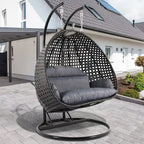 LeisureMod Sedia a Uovo Sospesa per 2 Persone con Supporto - Dondolo Pensile per Esterni/Interni in Rattan Intrecciato con Cuscini