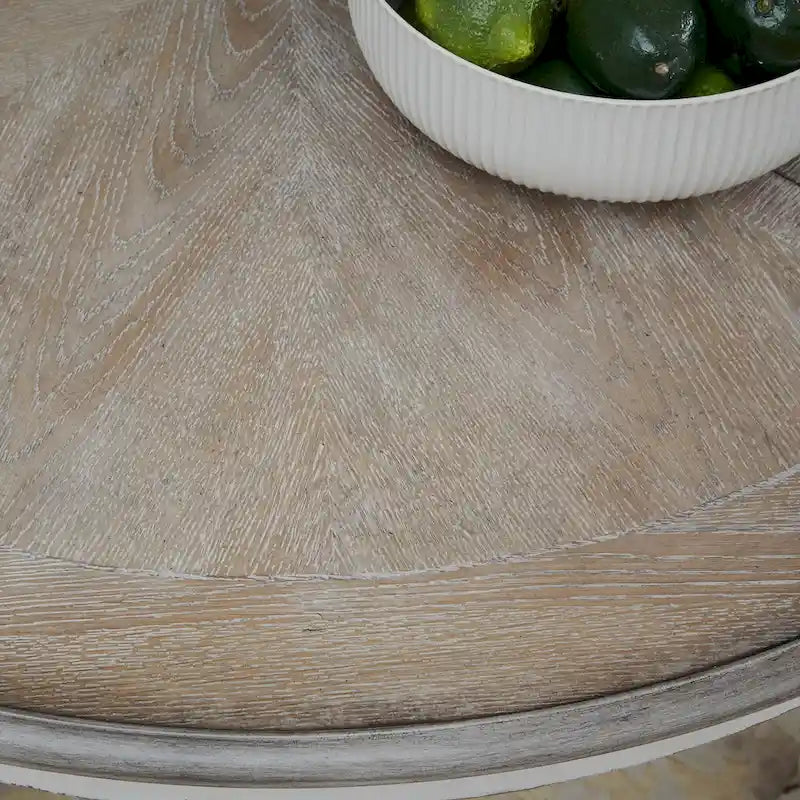 Tavolo da pranzo rotondo Magnolia Manor con base a piedistallo e prolunghe – 2 finiture