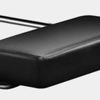 Sedia da ufficio girevole ergonomica in pelle nera con poggiapiedi