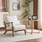 Poltrona d'accento rivestita in misto lino con gambe in legno e un cuscino, beige